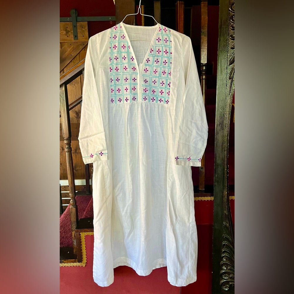 One-of-a-kind “jisti” hand embroidered cotton tunic from Pakistan.